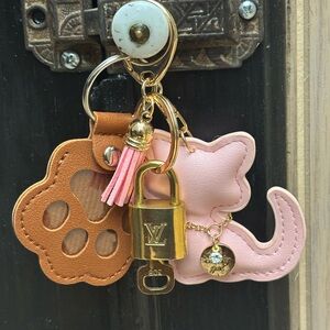 Authentic Louis Vuitton Lock Key Pink Cat Tassel, Paw, Purse Charm, Key Charm